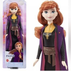 Mattel Disney Frozen Toys, Anna Fashion Doll & Accessory with Signature Look 100